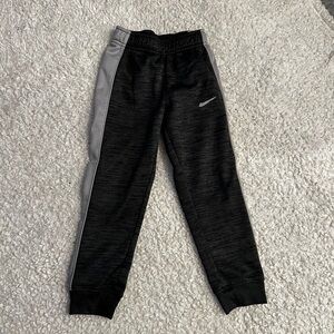 boys black and gray Nike dri-fit joggers. size medium6/7).